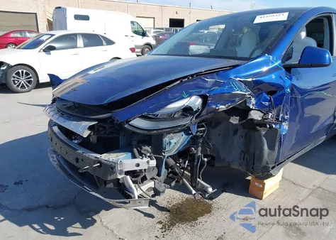 2022 Tesla Model Y Performance Dual Motor All-Wheel Drive z USA, uszkodzony, nr VIN 7SAYGDEF4NF510849